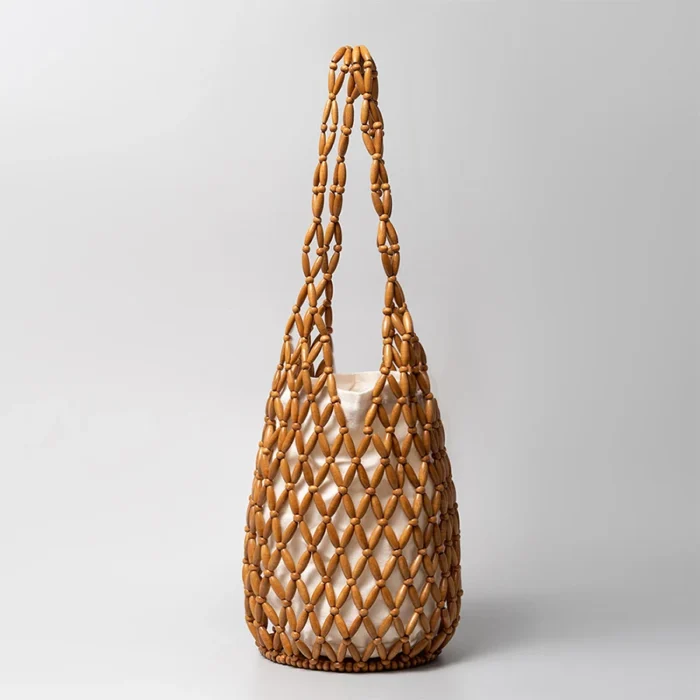 kf S4d0dc744ba93488c8fef9115951ac2d7m Women Woven hand bag summer design hollow out wooden bead tote bucket shoulder bag female Reticulate