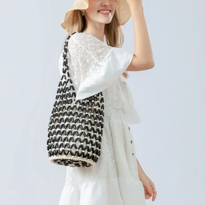 kf Sa2556b300b44454aa2c49a8b53ea7779V Women Woven hand bag summer design hollow out wooden bead tote bucket shoulder bag female Reticulate